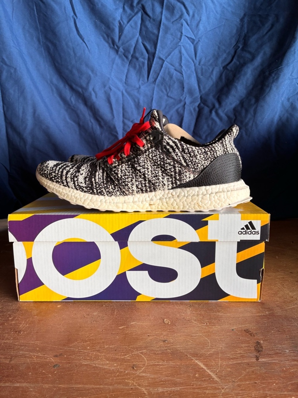 Adidas Black and White Knit Sneaker with Red Accents